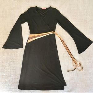 Long sleeve black wrap dress with bell sleeve.